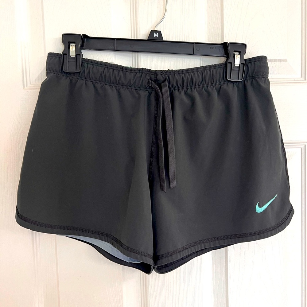 Nike Medium shorts with built in shorts underneath and drawstring